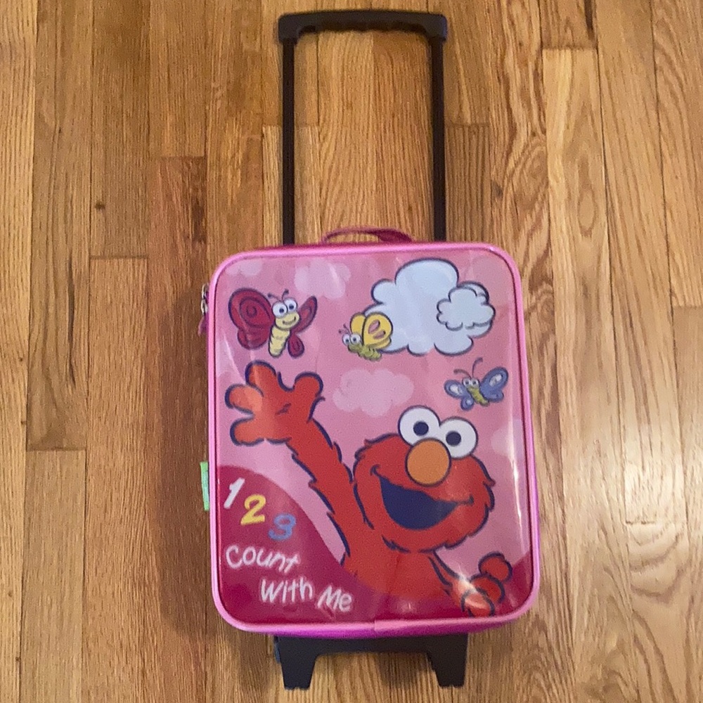 Girls Sesame Street Elmo mini rolling luggage